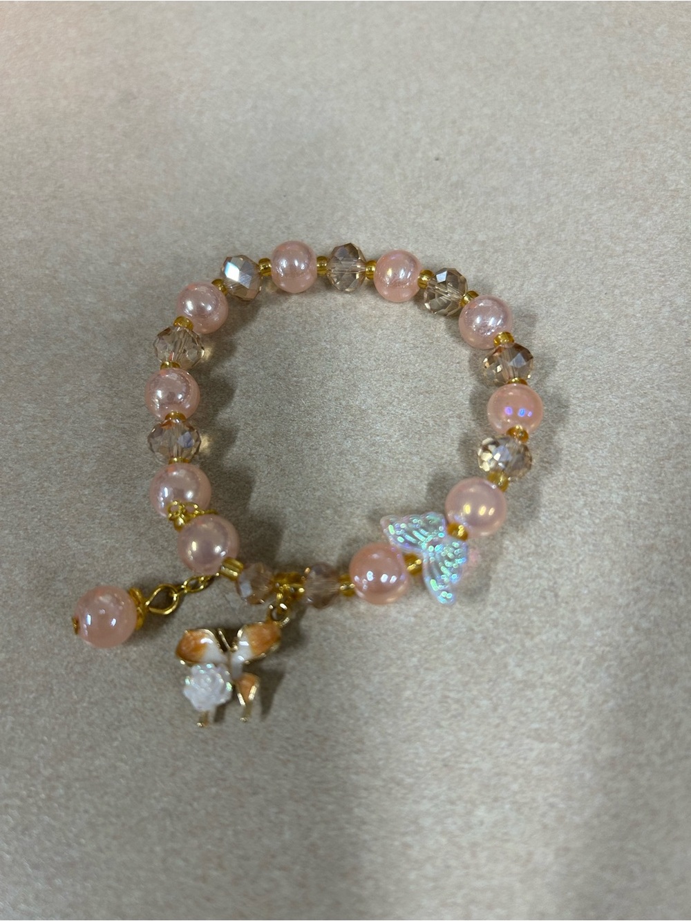 Elegant champagne synthetic Pearl and bead Charm Bracelet by